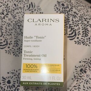Clarins Aroma Tonic Treatment Oil with Green and Yellow Accents